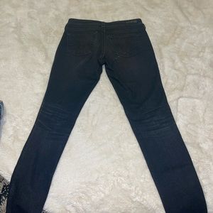 dark charcoal mid rise skinny jeans